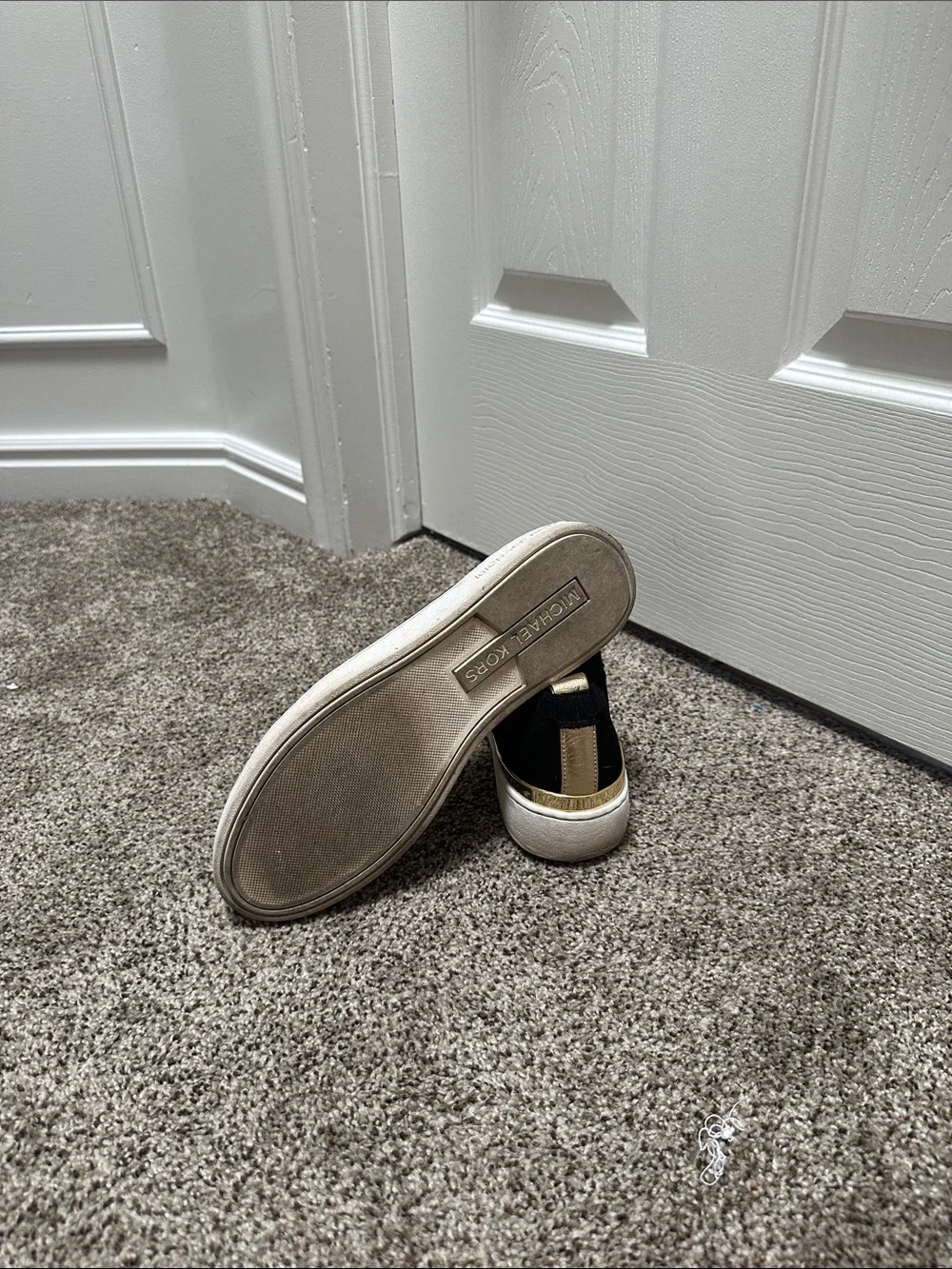 Women’s Black Slip-On Knit Sneakers with Gold Accent
